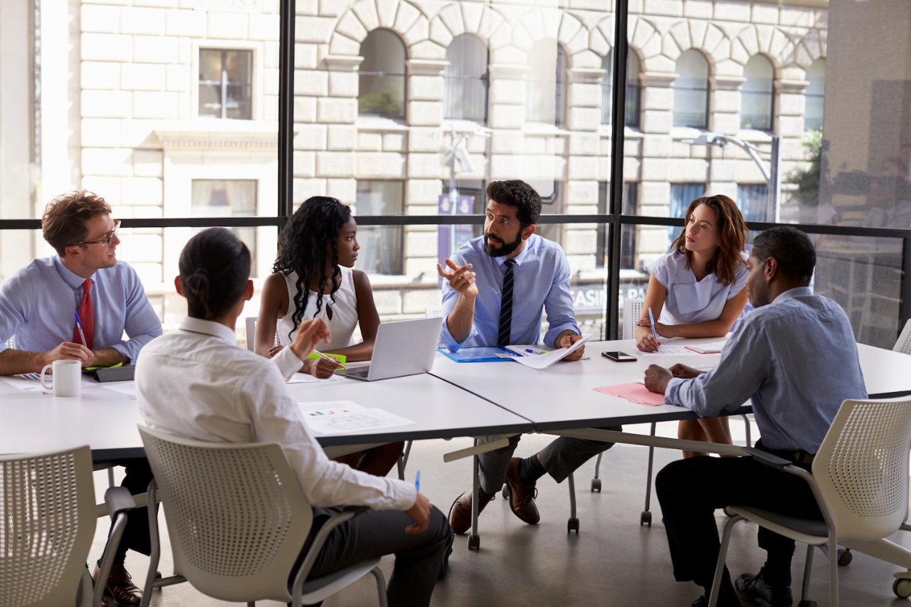 People sitting around a conference table