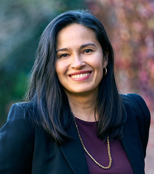 Smiling photo of Dean Odette Lienau