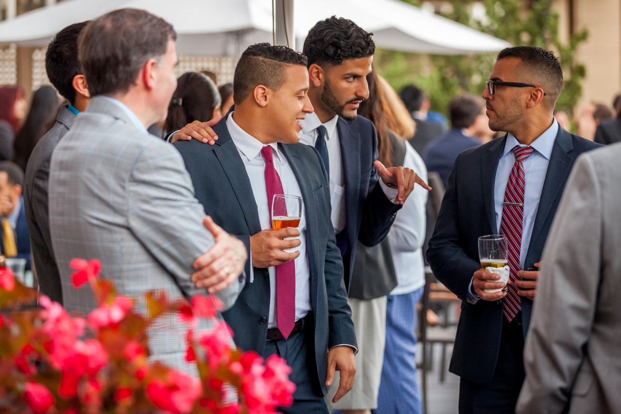 BC Law Students talking over cocktails at Ahana Retreat