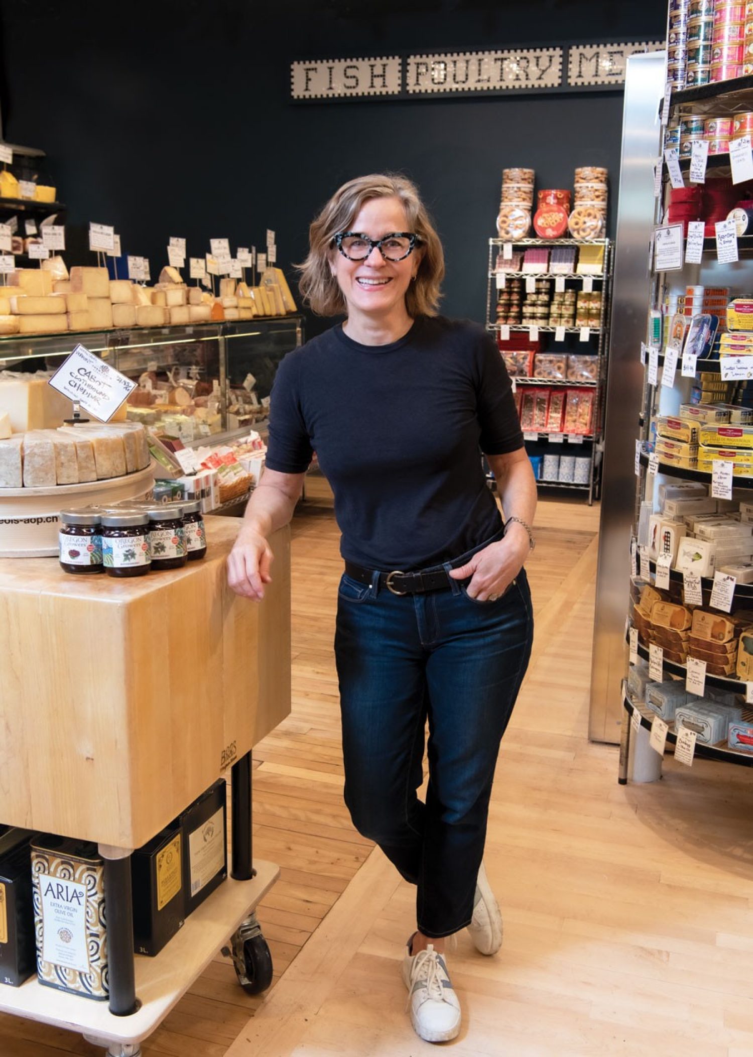 Valerie Gurdal ’85 in her shop Formaggio Kitchen