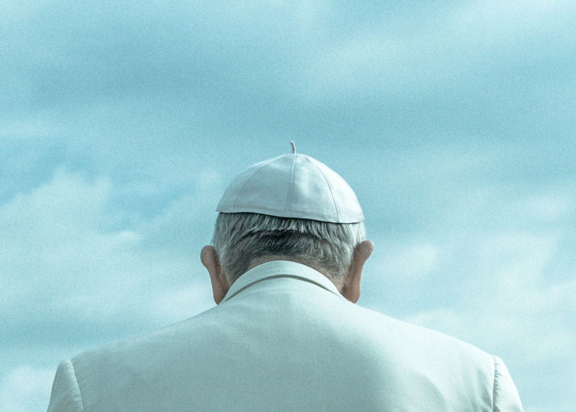 Pope Francis with his back turned