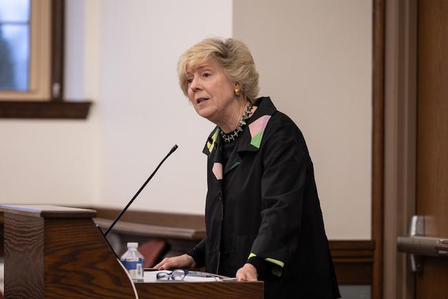 Rev. Nancy Taylor speaking at the podium