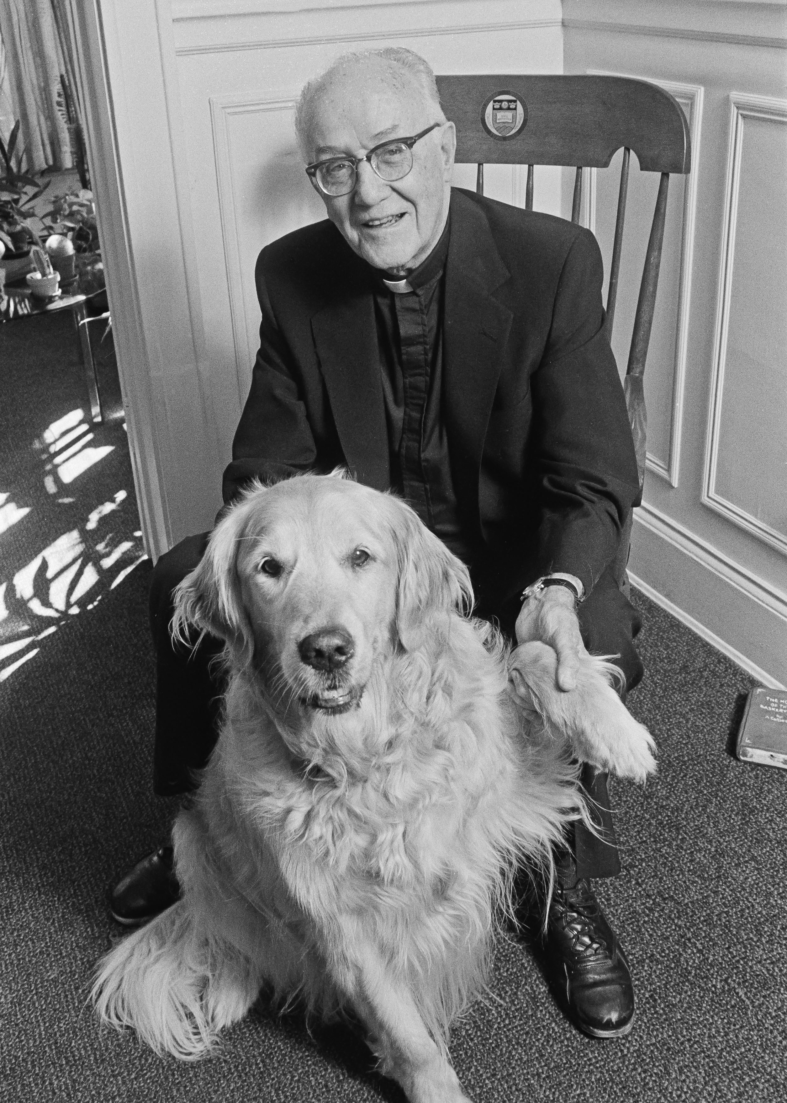 "Echoes of a University Presidency: Selected Speeces" by J. Donald Monan, SJ. Published in 2008 by Linden Lane Press.
Page 95.
Academic vice president Charles F. Donovan, SJ, with Brandy.