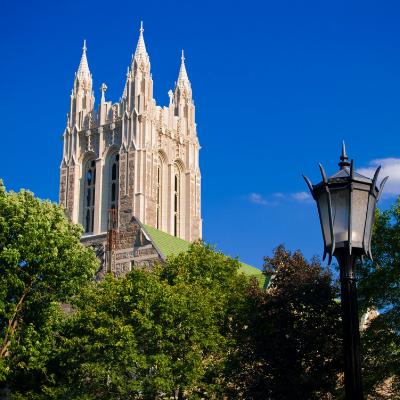 Gasson Hall through the trees