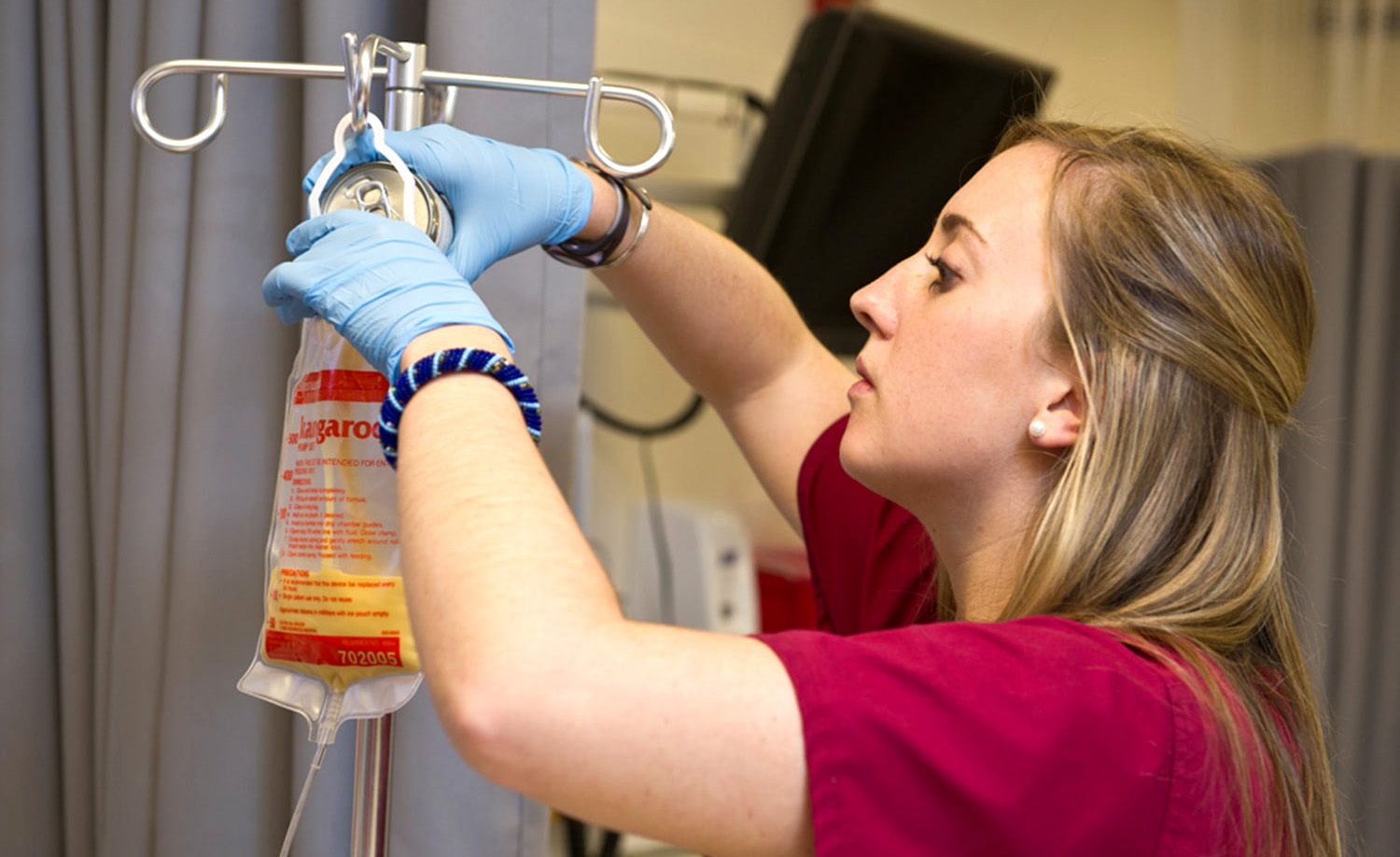 Continuing education student preparing to insert a peripheral line