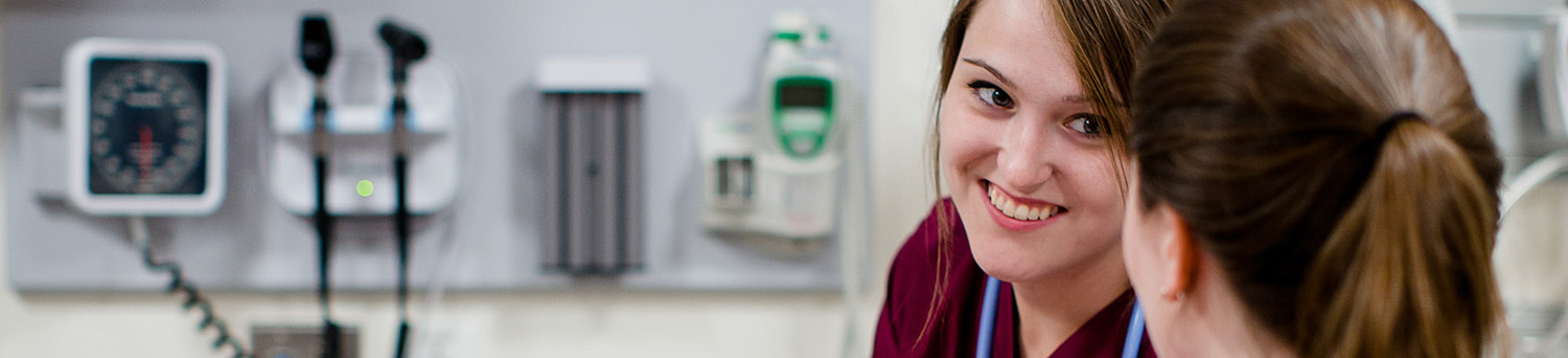 Students talking in a doctor's office