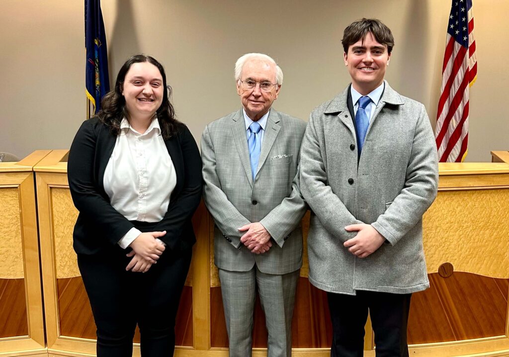 Isabella Burrell ’25, Thomas Carey ’65, and JP LaBarge ’25