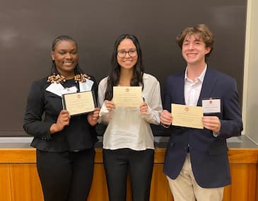 Image of Dean's Scholars and distinguished Sophmore Scholars. From left to right: Nnenna Okorie (junior), Abigail Leon (sophomore), and Frederick Osborne (sophomore); not pictured: Evan Tall.