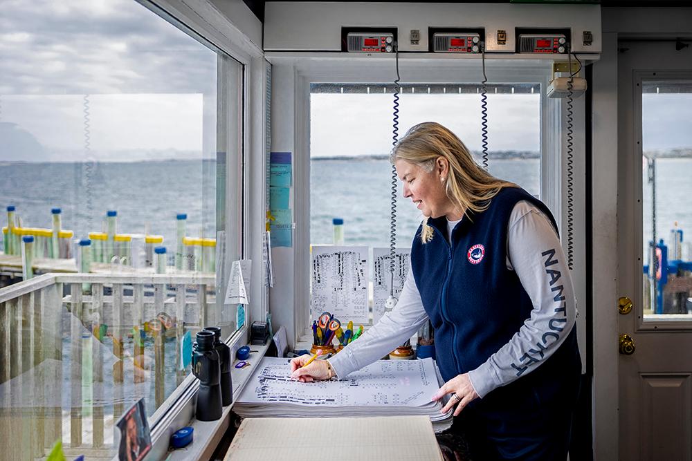 Christina Martin writing on a chart in her office