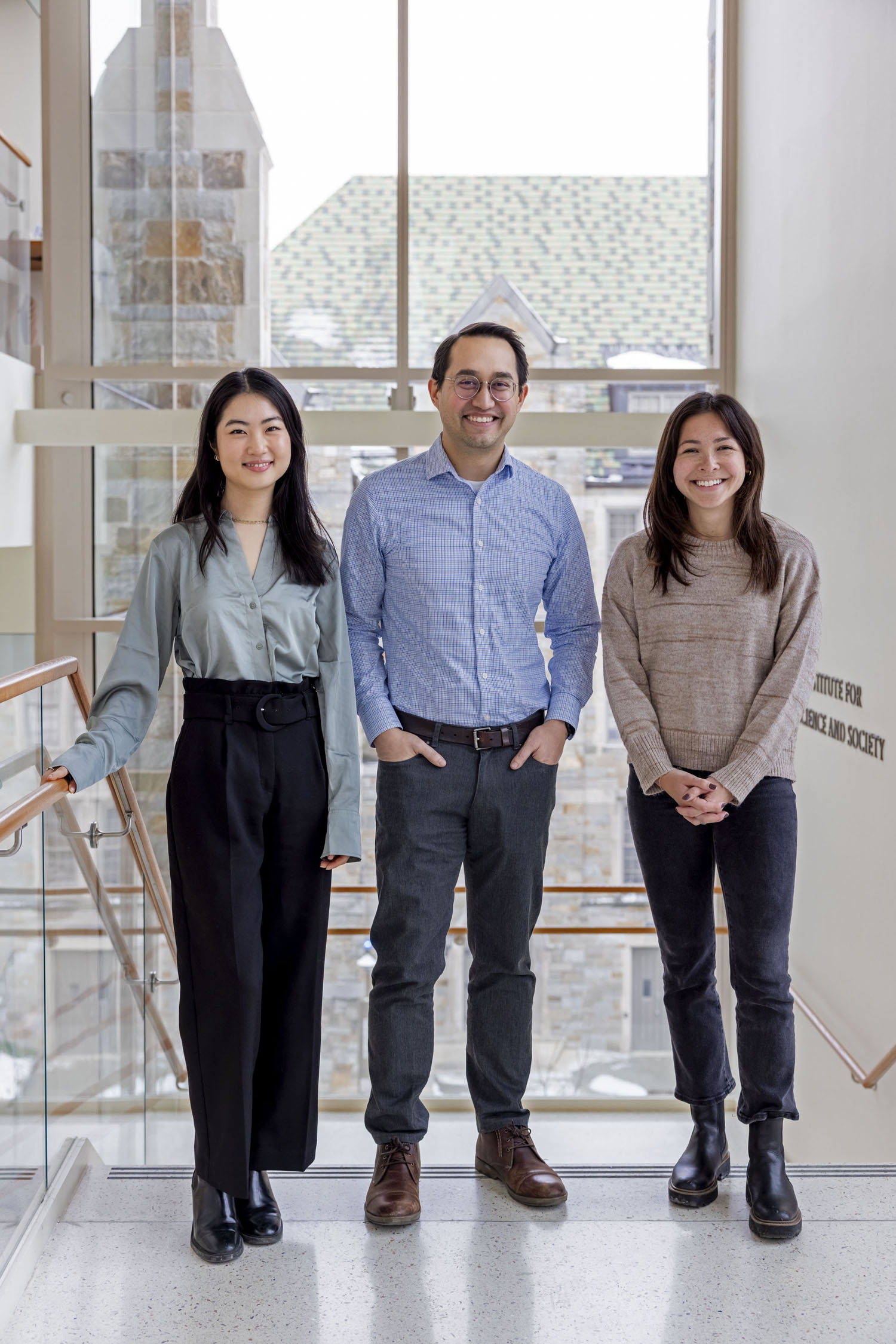 January 23, 2024 -- Bryan Ranger, Assistant Professor of Engineering at Boston College's Morrissey College of Arts & Sciences, working with Connell School of Nursing students Marisa Albert, CSON '25 (brown sweater and Jini (Ji In) Kim, CSON '25 (green shirt). Photographed for the February 1, 2024 issue of Chronicle regarding Ranger's focus on work using ultrasound devices that will more effectively monitor malnutrition.