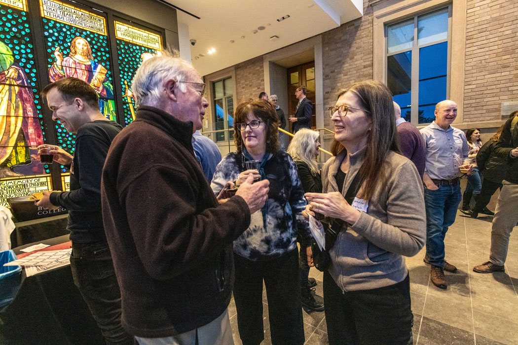 Coverage of the Faculty Pub at the McMullen Museum held in the atrium of McMullen.
Jeremy Evans (evansjv@bc.edu) & Matt Rutledge (organizers).
Joe Quinn (L) (Economics) having a conversation with Elizabeth Graver (c) and Suzanne Matson (r) (English).